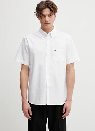 Бавовняна біла сорочка lacoste з коротким рукавом