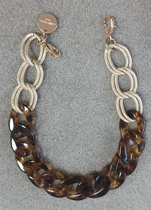 Аксессуар от бренда cherry chain, использование аксессуара в качестве декоративной ручки для сумки или акцентного ремешка для телефона.