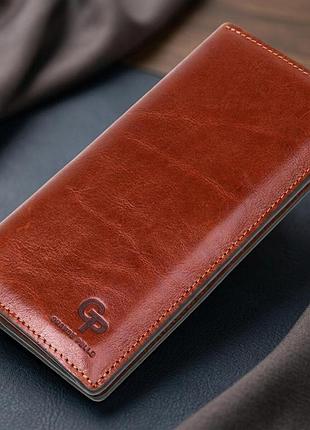 Кожаный вертикальный купюрник grande pelle 11213 коричневый