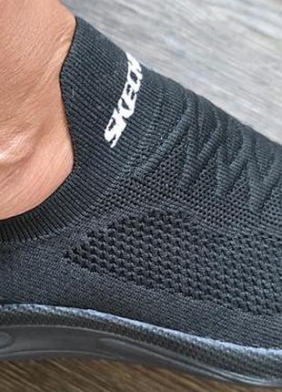 Кроссовки фирмы skechers