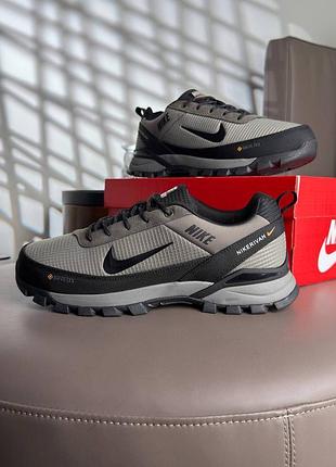 Nike rivah taupewood black