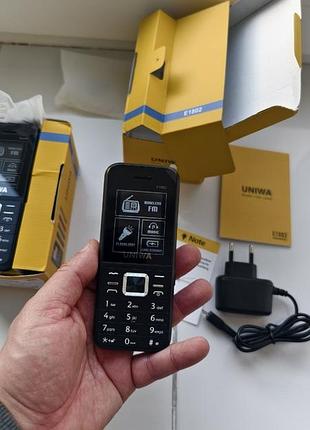 Мобильный телефон uniwa e1802 6
