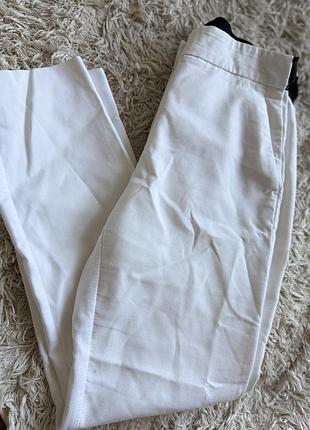 Білі брюки zara