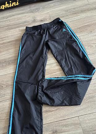 Нові штани adidas з плащівки