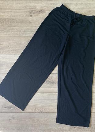 Легкі штани палаццо