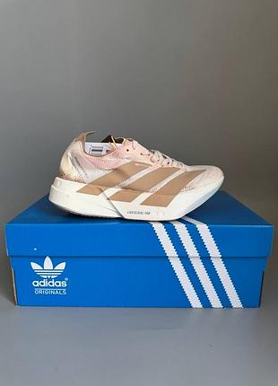 Уцінка бігові кросівки adidas adizero evo sl gold/pink