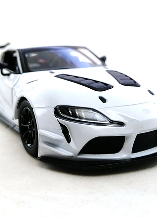 Машинка металлическая kinsmart 1:36 toyota gr supra racing concept kt5421w инерционная, двери открываются / белый