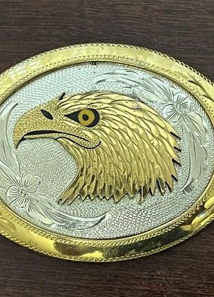 Вінтажна пряжка для ременя у вестерн-стилі з рельєфним зображенням голови орла.