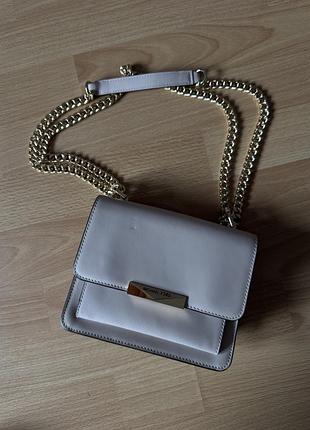 Шкіряна сумочка michael michael kors ніжно рожева