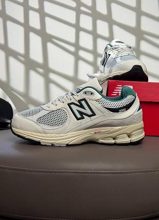New balance 2002r pouch beige green