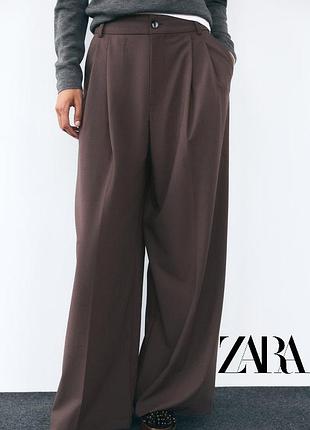 Стильные брюки с защипами zara