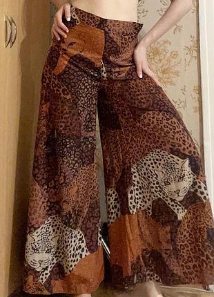 Жіночі яскраві штани wide leg у леопардовий принт