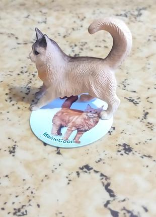 «famous pet cat series» blind box
фигурка котика 
породи (мейн-кун)
коричнево-черного цвета