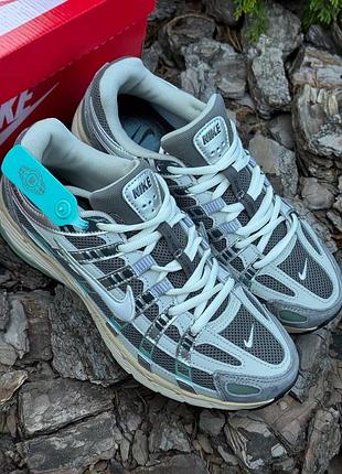 Кросівки nike p-6000 сірі з бірюзовими вставками