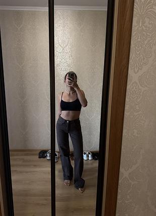 Коричневі джинси від mango