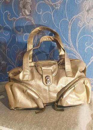 Екслюзивна сумка avon срібляста 2006 року