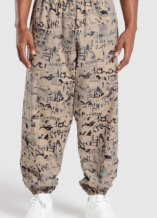Спортивные штаны gymshark lifting oversized printed woven pants