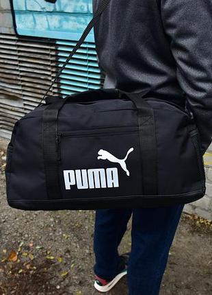 Спортивная сумка puma sports bag черная дорожная мужская / женская