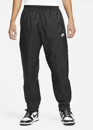 Штани чоловічі nike windrunner woven lined pants black dx0653-011