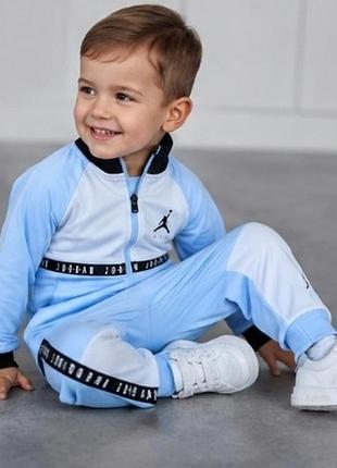 Оригінал блакитно-білий спортивний костюм jordan jumpman air blocked tricot set.