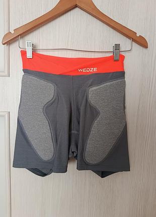 Спортивные шорты с защитой для зимних видов спорта от wedze decathlon, размер s-м, серого цвета с оранжевыми вставками