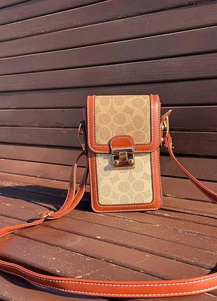Сумка для телефона в стиле coach коричневая эко кожа