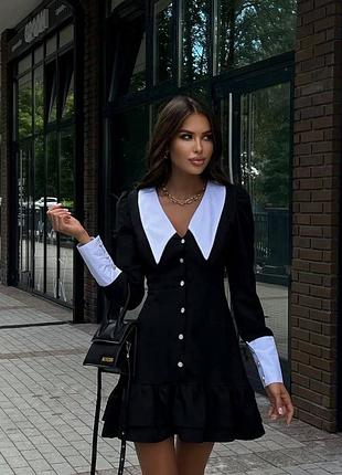 Стильна чорна біла сукня з корсетним ефектом