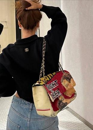 New new із нової колекції métiers d’art 26  чорний светр chanel