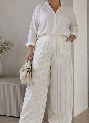 Шикарні широкі  молочні  вільні штани  в смужку linen next