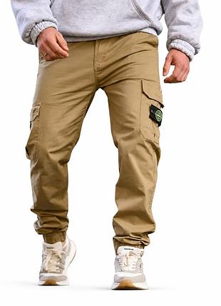 Штани джогери чоловічі stone island бежевий вт5351, стрейч котон, карго кишені, манжети резинка