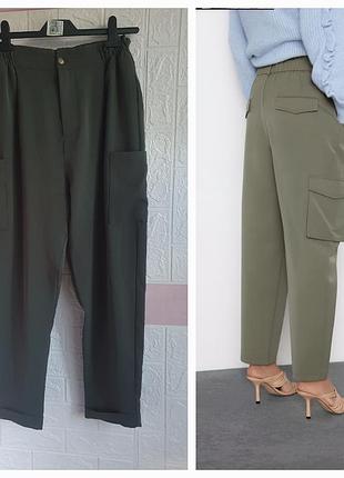 Зеленые с карманами брюки zara