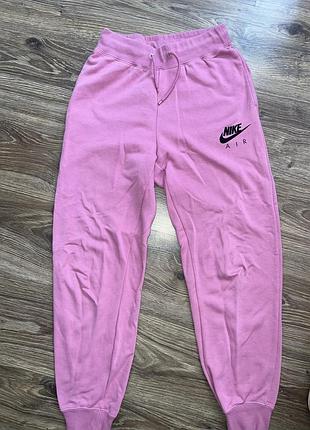 Рожеві спортивні штани nike