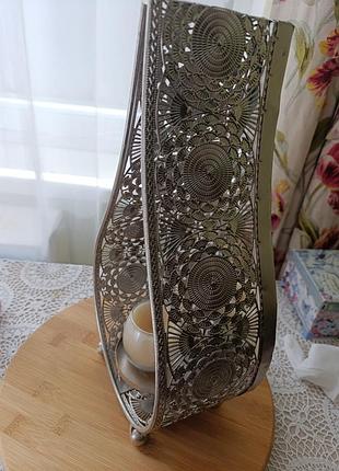 Изысканный подсвечник