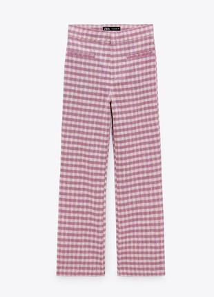 Дитячі рожеві штани в клітинку від zara kids на дівчинку, мають злегка розкльошений крій