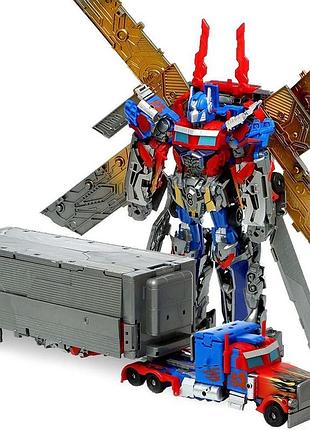 Робот-трансформер оптимус прайм optimus prime 3 в 1 з причепом, крилами та зброєю 34 см
