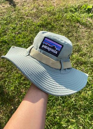 Панама мятного цвета с шейным шнурком из лого patagonia на объем головы 56-58 см