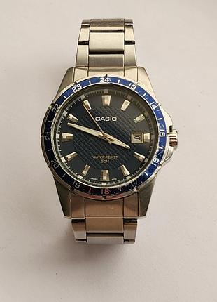 Мужские наручные часы casio mtp-1290d-2a (модификация mtp-1290d-2avef) с кварцевым механизмом и синим текстурированным циферблатом
