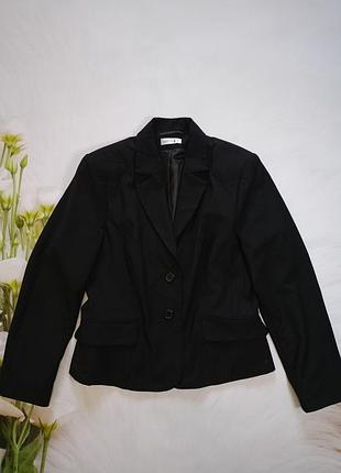 Класичний жіночий піджак, розмір l/xl.