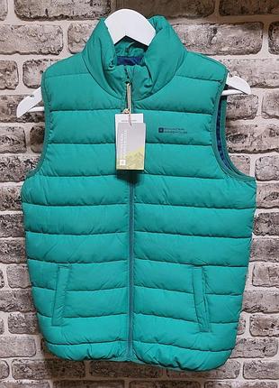 Продам жилетку на ребенка 13 лет бренда mountain warehouse. колir на 5м фото. камера засветлена.