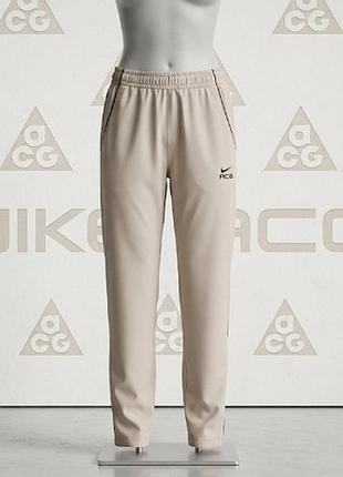 Оригинальные легкие ветровые брюки nike acg с технологией clima-fit. размер: l (8-10) страна производитель индонезия, оригинал