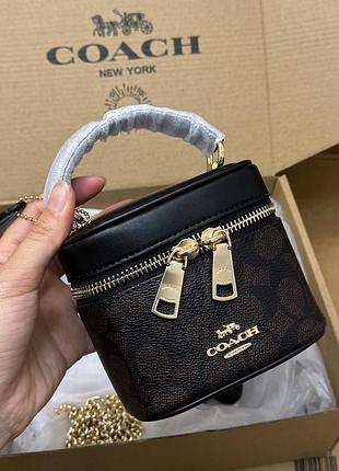 Сумочка бочонок coach коричнева на цепочці