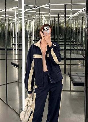 Трендовий костюм плащівка yves saint laurent синій беж штани та зіп кофта