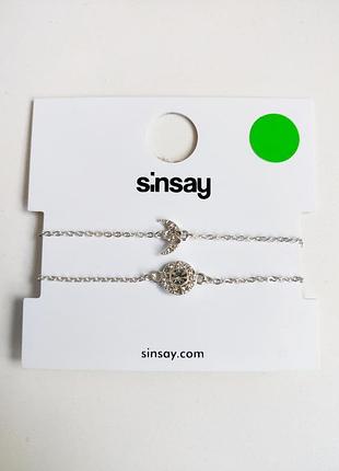 Комплект серебристых браслетов sinsay