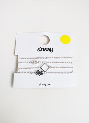 Комплект серебристых браслетов sinsay