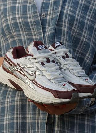 Nike initiator white 
burgundy crush