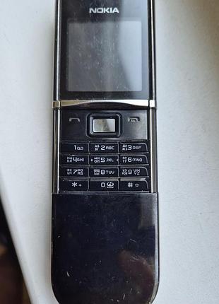 Продам кнопковий металевий мобільний телефон nokia 8800d чорного кольору