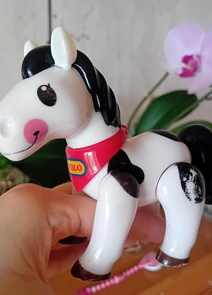 Коник розвиваюча іграшка tolo toys