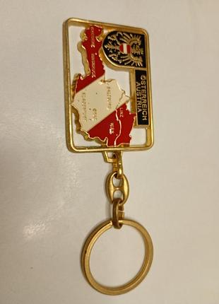 Винтажный коллекционный брелок "встрия" клетка, герб. брелок металликческий