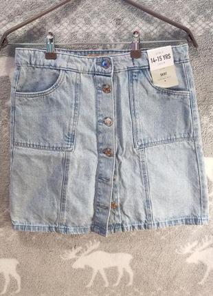 Джинсова спідниця з кишенями