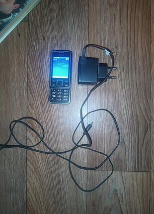 Телефон nokia 6300 с зарядкой